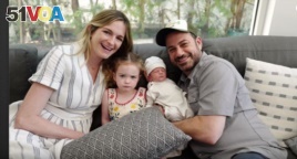 Jimmy Kimmel poses for a photo with his family after his new son, Billy, came home from the hospital.