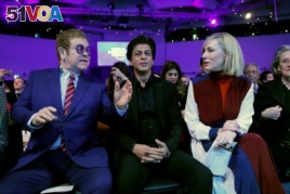 Actor Cate Blanchett, actor Shah Rukh Khan and singer Elton John are pictured at the Crystal Awards ceremony of the annual meeting of the World Economic Forum (WEF) in Davos, Switzerland, Jan. 22, 2018.