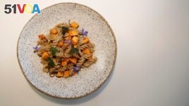 A dish made with mealworms and cooked by French chef Laurent Veyet