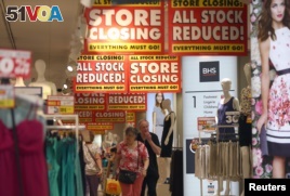 Shoppers walk in a BHS store in London, July 25, 2016. The so-called Brexit means the city could lose its right to sell services tariff-free across the European Union, risking its position as Europe's financial headquarters.