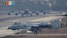 FILE - A U.S. Air Force A-10 Thunderbolt II fighter jet lands at Incirlik airbase in the southern city of Adana, Turkey, Dec. 10, 2015.