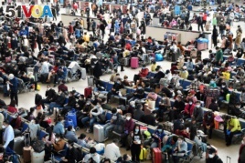 Travellers are seen inside Hankou Railway Station after travel restrictions to leave Wuhan, the capital of Hubei province and China's epicentre of the novel coronavirus disease (COVID-19) outbreak, were lifted, April 8, 2020. (REUTERS)
