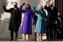 President-elect Joe Biden, his wife Jill Biden and Vice President-elect Kamala Harris and her husband Doug Emhoff arrive at the steps of the U.S. Capitol for the start of the official inauguration ceremonies, in Washington, Wednesday, Jan. 20, 2021