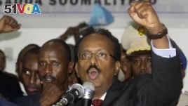 New Somali President Mohamed Abdullahi Farmajo celebrates winning the election and taking office in Mogadishu, Somalia Wednesday, Feb. 8, 2017.