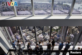 Visitors to the newly opened One World Observatory in New York, May 29, 2015.