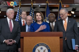 Speaker of the House Nancy Pelosi, Senate Minority Leader Chuck Schumer, and other congressional leaders react to a failed meeting with President Donald Trump, at the Capitol in Washington, May 22, 2019.