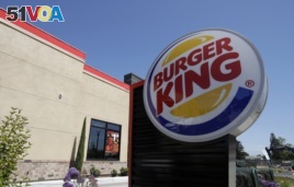 FILE - This April 25, 2019, file photo shows a Burger King in Redwood City, Calif. Burger King is announcing its work to help address a core industry challenge: the environmental impact of beef. To help tackle this environmental issue, the Burger King br