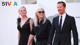 FILE PHOTO- Director Jane Campion with actors Benedict Cumberbatch and Kirsten Dunst at the 78th Venice Film Festival for the film 'The Power of the Dog' in Venice, Italy on September 2, 2021. (REUTERS/Yara Nardi/File)