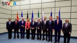 Secretary Kerry Posed for a Group Photo With EU, P5+1, and Iranian officials before the final plenary of Iran nuclear negotiations in Vienna, Austria.
