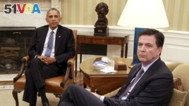 U.S. President Barack Obama (L) sits with FBI Director James Comey in the Oval Office in Washington after making comments to the media about shootings at military facilities in Chattanooga, Tennessee, July 16, 2015.