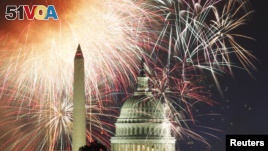Fireworks light up the sky over the United States Capitol dome and the Washington Monument in Washington July 4, 2011 .  (REUTERS/Hyungwon Kang)