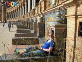 Frances Downey sits at the Plaza de Espa<I>&#</I>241;a in Seville, Spain during her time studying there in 2007.