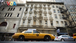 It is not always easy to get a cab in New York City. But once you get one, you may not have to say a word. Pictured here, a taxicab drives past 51 Park Place, NYC. (REUTERS/Lucas Jackson) 