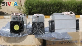 This undated photo provided by the Police News Agency, shows boxes of machinery used in Bitcoin 
