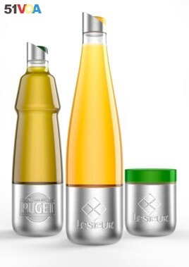This photo shows Lesieur's stainless steel vegetable oils and mayonnaise containers designed for use with Loop. (Team Cr<I>&#</i>233;atif/Lesieur/TerraCycle via AP)