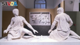 In this undated photo made available Monday, Oct. 12, 2020, ancient Greek and Roman marble statues are seen prior to going on display in the newly refurbished Villa Caffarelli. (Fondazione Torlonia via AP)
