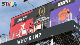 Clemson Tigers fan Nancy Volland and Alabama Crimson Tide supporter Llyas Ross Sr., who have been living on ESPN Billboard ahead of Monday's national championship game as part of an ESPN contest since December 26, 2018, are seen in this photo taken downto