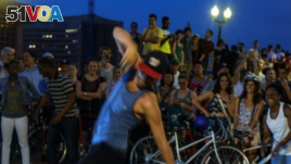 D.C. Bike Party riders often take a break at parks or open areas, where they listen to music and dance.