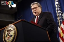 Attorney General William Barr speaks about the release of a redacted version of special counsel Robert Mueller's report during a news conference, Thursday, April 18, 2019, at the Department of Justice in Washington. (AP Photo/Patrick Semansky)