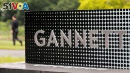 FILE - The logo of Gannett Co is seen outside their corporate headquarters in McLean, Virginia, July 23, 2013. ( REUTERS/Larry Downing//File Photo)
