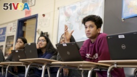 Students, including Aayush Gupta, right, take part in government class at Hightstown High School in Hightstown, New Jersey, Tuesday, Feb. 19, 2019. 