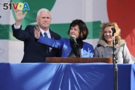 (L-R) U.S. Vice President Mike Pence, his wife Karen Pence and their daughter Charlotte Pence arrive for a rally on the National Mall before the start of the 43rd annual March for Life January 27, 2017 in Washington, DC.