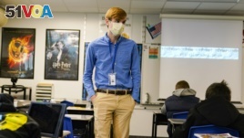 Cooper Hanson, a student at Hanover College, is one of several college students being recruited to work as substitute teachers in schools during the pandemic. Thursday, Dec. 10, 2020.