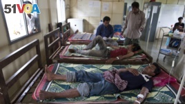 This 2009 photo shows malaria patients being treated at the hospital in Cambodia. (AP Photo/David Longstreath)