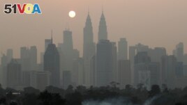 A view shows the city shrouded by haze in Kuala Lumpur, Malaysia October 9, 2023. (REUTERS/Hasnoor Hussain)