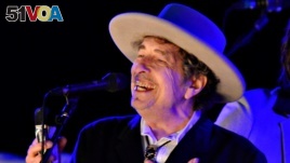 FILE - U.S. musician Bob Dylan performs during the second day of The Hop Festival in Paddock Wood, Kent, June 30, 2012. 