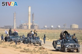 Members of Iraqi federal forces gather near oil fields in Kirkuk, Iraq, Oct. 16, 2017. (Reuters)