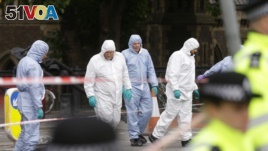 Forensic police investigate an area in the London Bridge area of London, June 5, 2017.