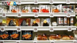 FILE - Food products are displayed at Lawson Open Innovation center during an event introducing its next-generation convenience store model in Tokyo, Japan December 4, 2017. (REUTERS/Kim Kyung-Hoon/File Photo)