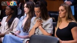 U.S. Olympic gymnasts Simone Biles, McKayla Maroney, Aly Raisman and Maggie Nichols arrive to testify during a Senate Judiciary hearing about the Inspector General's report on the FBI handling of the Larry Nassar investigation of sexual abuse