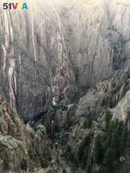 The Gunnison River is seen flowing through Black Canyon