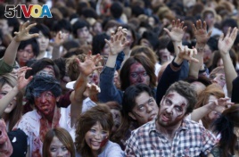 Zombies are also commonly seen at Halloween. Here, people dress as zombies during a Halloween event to promote the show 