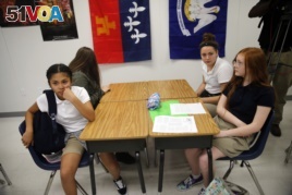 FILE - Students attend an eight grade class at Southside Middle School in Denham Springs, Lousiana.