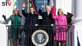 U.S. President Joe Biden and French President Emmanuel Macron wave with their wives Brigitte Macron and U.S. first lady Jill Biden at the official State Arrival Ceremony for Macron in Washington, U.S., December 1, 2022. (REUTERS/Kevin Lamarque)