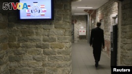 A staffer of the NATO Cooperative Cyber Defense Center of Excellence walks in the center in Tallinn, Estonia.