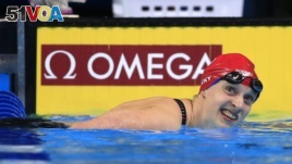 Katie Ledecky smiles after winning the women's 200-meter freestyle final at the U.S. Olympic swimming trials in Omaha, Neb., Wednesday, June 29, 2016.