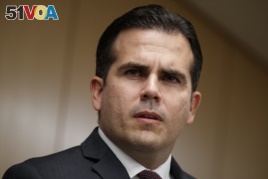 In this Nov. 13, 2017, photo, Puerto Rico Gov. Ricardo Rossello speaks during a news conference, in Washington. Rosello said on Jan. 22, 2018.
