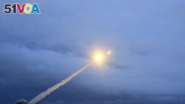 This video grab provided by RU-RTR Russian television via AP television, March 1, 2018, shows the launch of what President Vladimir Putin said is Russia's new nuclear-powered intercontinental cruise missile.