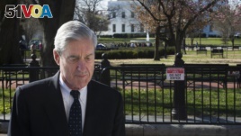 Special Counsel Robert Mueller walks past the White House after attending services at St. John's Episcopal Church, in Washington, Sunday, March 24, 2019.