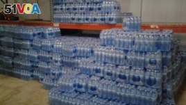  Packs of bottled water are stocked in the office of Civil Protection in Fort-Liberté, Haiti. (File)