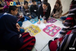 Children from Syria playing games in Lebanon as part of the 
