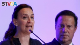 Argentina's Vice President Gabriela Michetti addresses the audience during the opening ceremony of Expocomer International Trade Fair next to Panama's President Juan Carlos Varela at the Atlapa Convention Center in Panama City, March 9, 2016. 