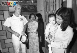 John McCain visits the Holt orphanage in Saigon, Vietnam, on Oct. 30, 1974.
