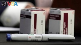 FILE - Insulin products are displayed in front of David Ricks, chairman and chief executive officer of Eli Lilly and Company, during the Senate Health, Education, Labor, and Pensions Committee hearing on Capitol Hill in Washington, Wednesday, May 10, 2023(AP Photo/Carolyn Kaster)