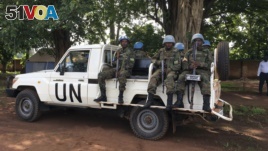 United Nations Peacekeepers drive through Yei, South Sudan, July 13, 2017. The United Nations peacekeeping mission's chief says Yei has 