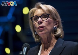FILE - Education Secretary Betsy DeVos speaks during a student town hall at National Constitution Center in Philadelphia.